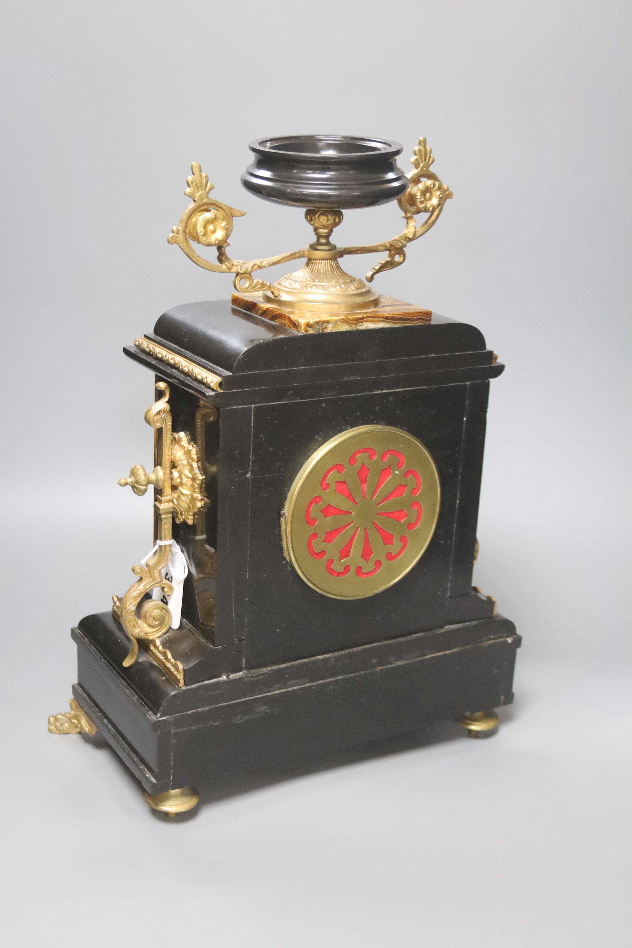 A 19th century French slate and onyx mantel clock, Lyon, height 42cm